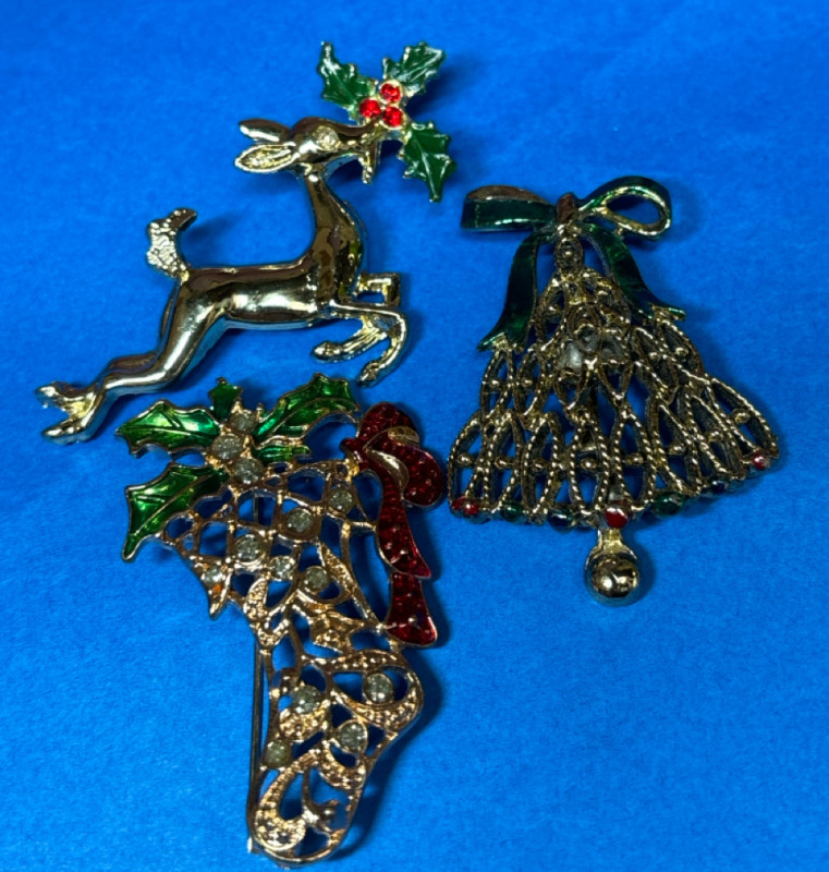 Three Vintage Festive Brooches Enamel Rhinestone Boot Bell Reindeer