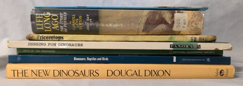 7 Vintage to Newer Dinosaur/Archeological Books. 6 Hardcover, 1 Softcover. Tallest is 11.5" Tall