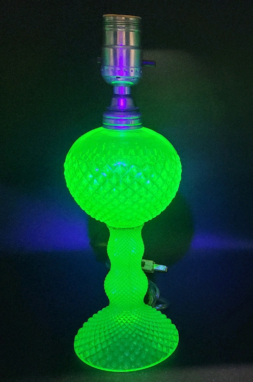 Vintage Vaseline Uranium Glass Westmoreland English Hobnail Lamp . Measures 12" Tall . Appears to have been converted from oil lamp to electric Lamp . Original Bottom Glass has not been Altered. No chips or cracks . Tested Working.