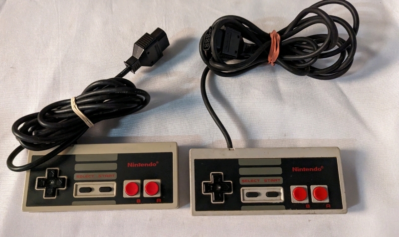 2 Nintendo NES Controllers.