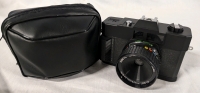 Vintage Kinetic 50mm Camera. Comes with case and lese cover.