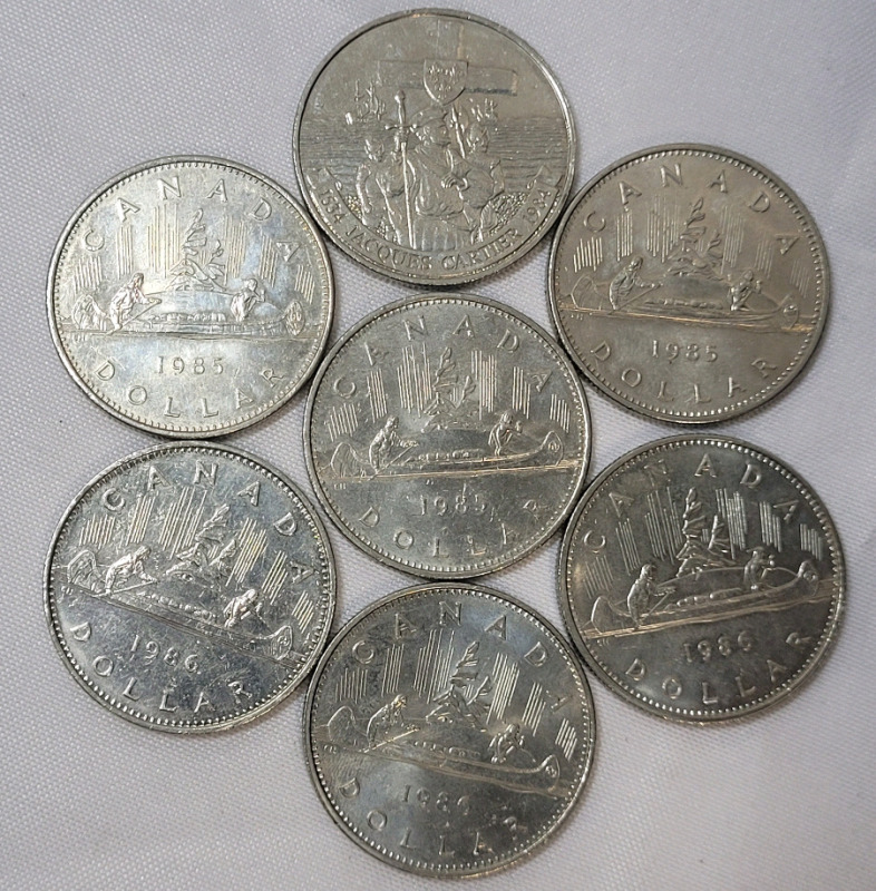 1984 - 1986 Canadian One Dollar Coins , Seven (7) Coins . 1984 , 1985 ×3 & 1986 ×3