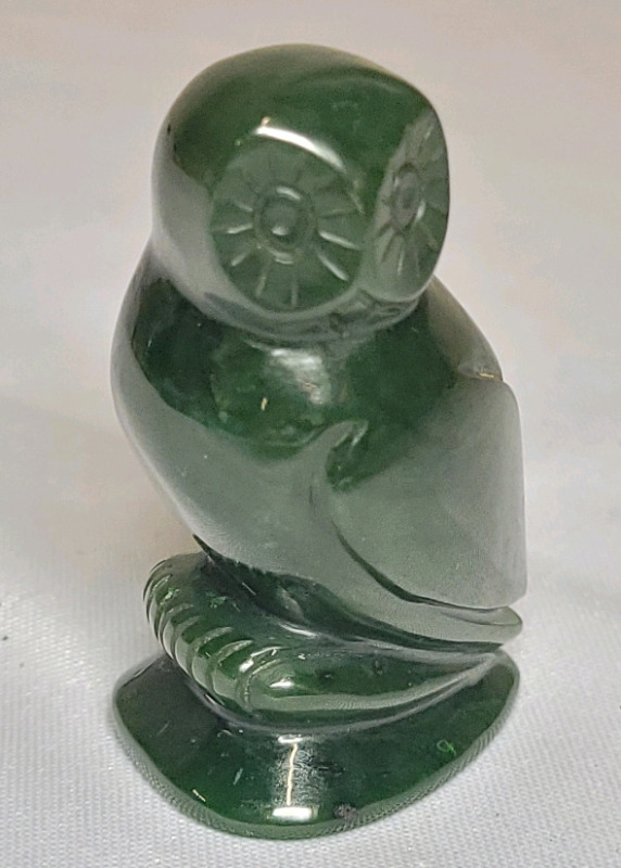 Green Jade Owl , measures 2" tall .