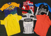 Men's Short Sleeve Cycling Jersey's . Some with Team Names & Sponsors . Men's Sizes Medium , Large & X-Large