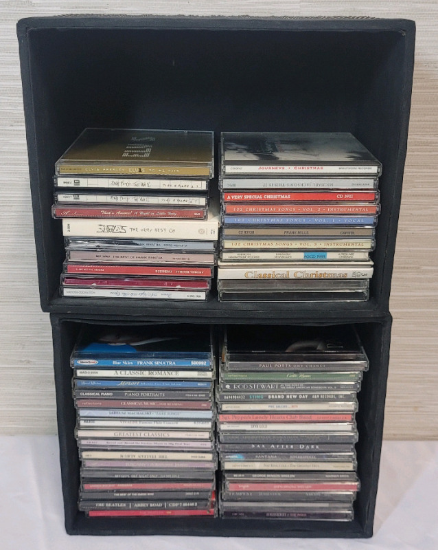 50+ Music CDs . Elvis , LED Zepplin , Beatles , Rock , Classical , Christmas , Adult Contemporary plus more . Not all cases checked for correct cd