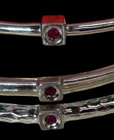 Three Elle Sterling Silver Ruby Bangles