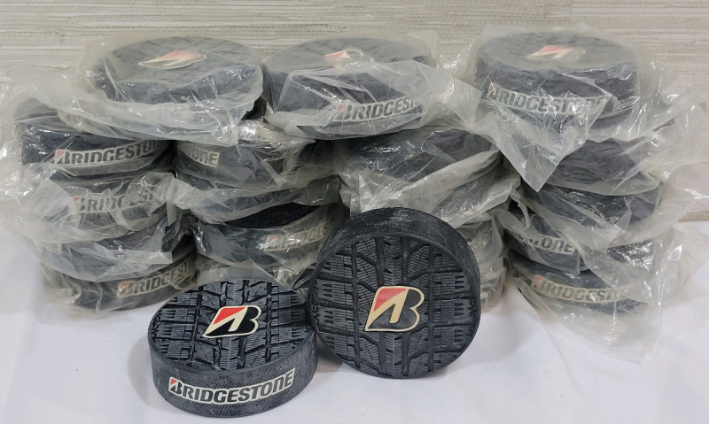 New - Bridgestone Advertising Rubber Hockey Pucks , 21 Pucks . Pucks measure 3"&times;1"