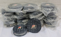 New - Bridgestone Advertising Rubber Hockey Pucks , 21 Pucks . Pucks measure 3"&times;1"