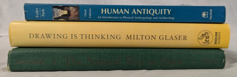 3 Art & Archeology Books. 2 Hardcover, 1 Softcover. " drawing is Thinking", "The Natural Way to Draw" and "Human Antiquity" 10" At Tallest.