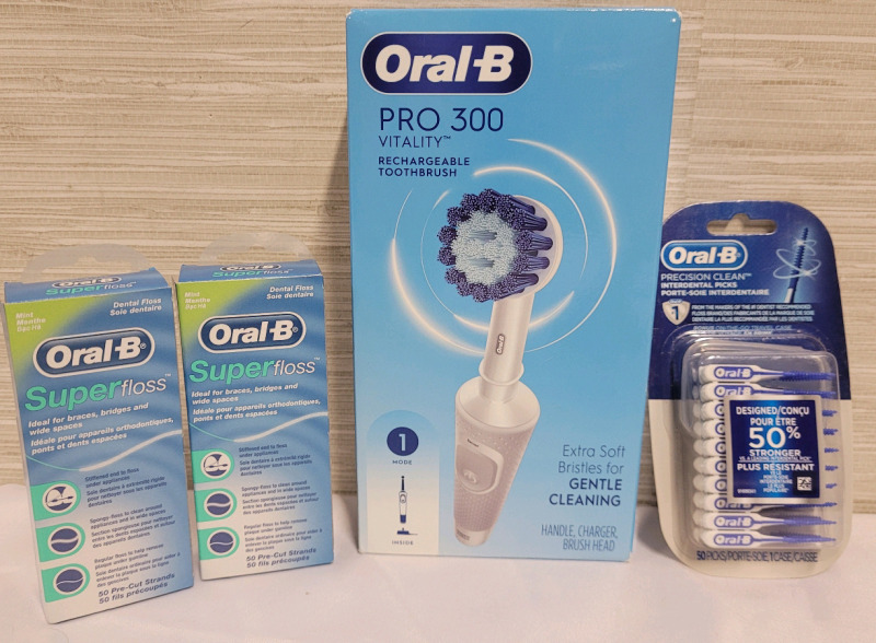 New - Oral-B Pro 300 Rechargeable Toothbrush , Extra Soft & Oral-B Super Floss plus Oral-B Interdental Clean