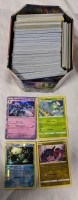 200+ Pokemon Trading Cards with Tin. Common to Rare. Holographics Included.