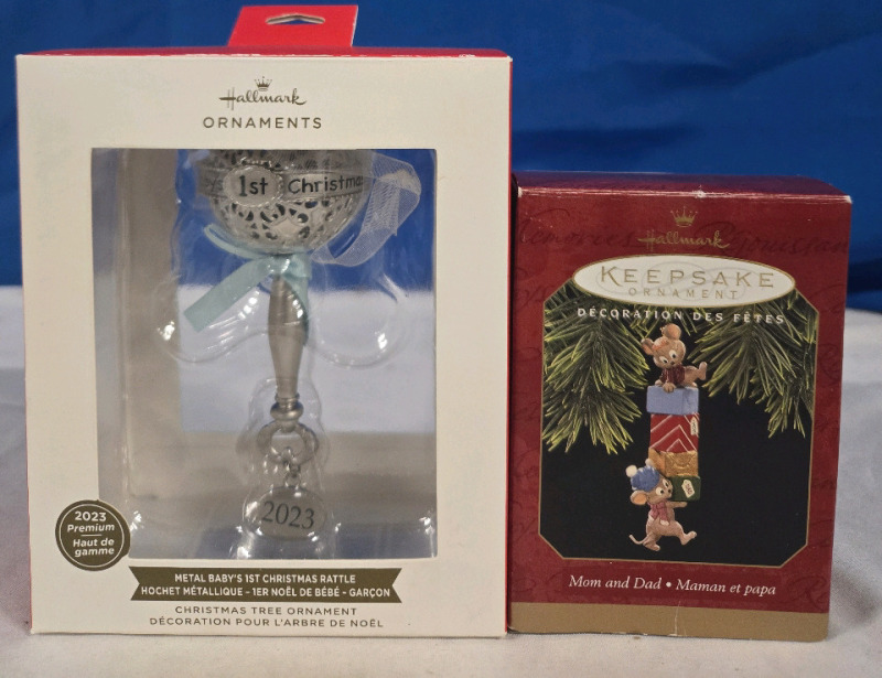 2 New | Hallmark Keepsake Christmas Ornaments | 1 2023 Metal Baby's First Christmas Rattle | & 1 1997 Mom & Dad Christmas Tree Ornament | Box Ranges In Size From 4.5" - 5.5" Tall