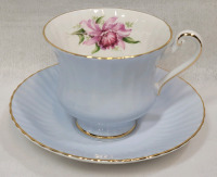 Paragon Light Blue Gold trim with Orchid Accent Cup & Saucer . Both Ring True , No chips or cracks