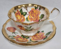 Queen Anne Yellow Rose w/Gold Trim Cup & Saucer . Both Ring True . No chips or cracks , some minor wear to gold trim