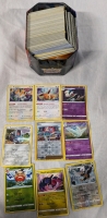 200+ Pokemon Cards With Tin. Common to Rare. Holographics Included.