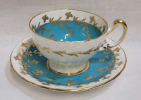 Aynsley Turquoise w/Gold Leaf Cup & Saucer . Both Ring True , small crack bottom tea cup (still rings true)