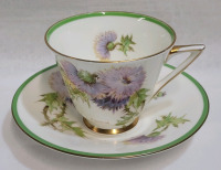 Royal Doulton Glamis Thistle Cup and Saucer , Signed P Curnock . Both Ring True , No chips or cracks