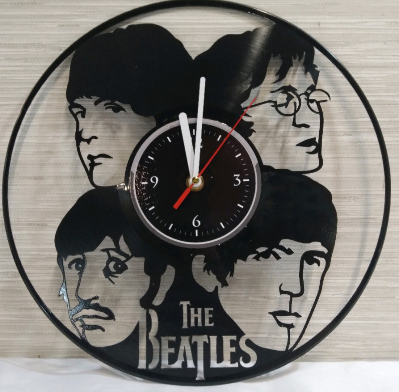 New 12" Laser Cut Vinyl "The Beatles" Clock . Requires One (1) A battery, not included