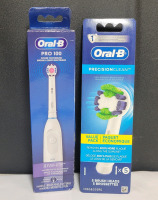 New - Oral-B Pro 100 Battery Powered Toothbrush & Oral-B 5-Pack Brush Heads .