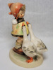Goebel Hummel " Goose Girl " Figurine . Measures 4 1/4" tall . Minor crazing present - 2