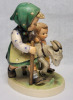 Goebel Hummel " Homeward Bound " Figurine . Measures 5 1/4" tall . No chips or cracks - 2
