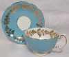 Aynsley Turquoise & White w/Gold Trim Cup & Saucer . Both Ring True , No chips or cracks