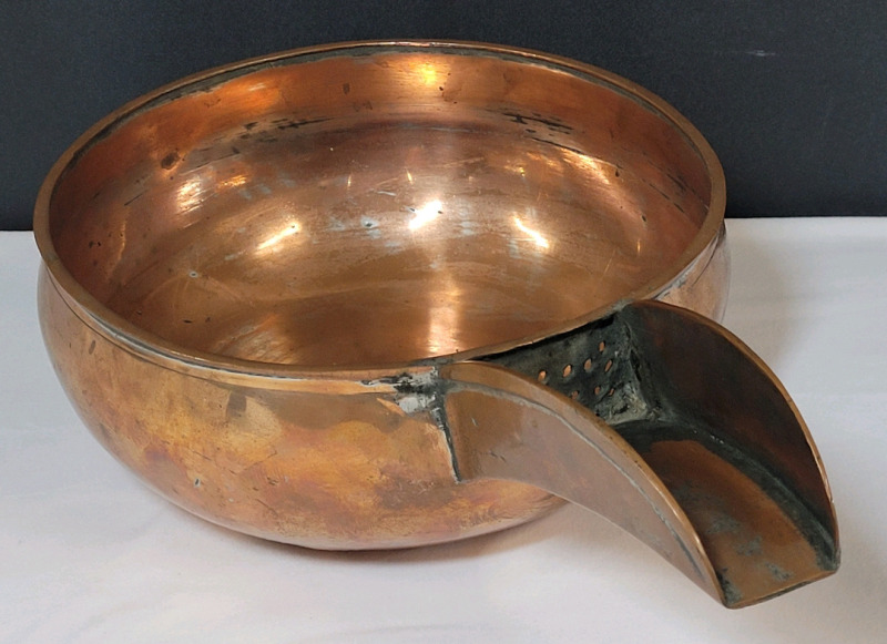 Vintage Copper Pot with Side Strainer Spout , Hallmark Stamp on Inside Bottom . Measures 8.5" diameter