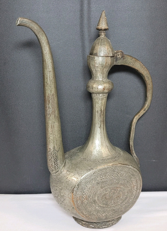 Vintage Islamic / Persian Engraved Tinned Plated Copper Ewer / Water Pitcher . Measures 14 1/8" tall .