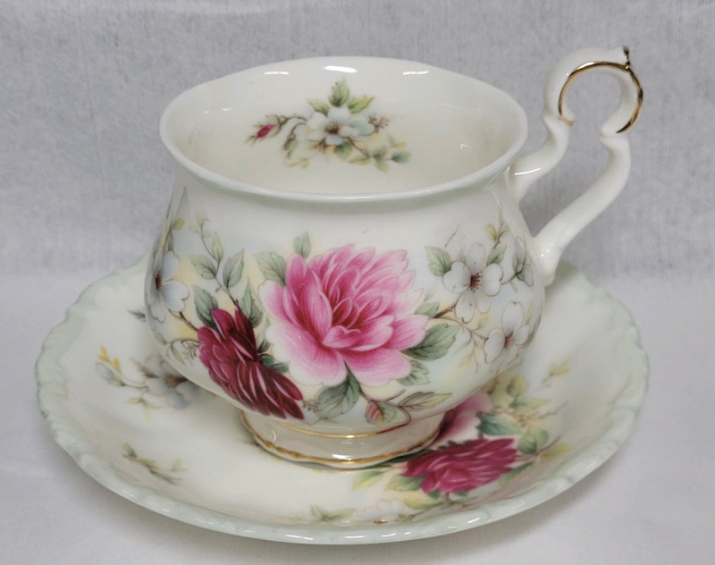 Royal Albert " Memories " Cup & Saucer . Both Ring True , No chips or cracks