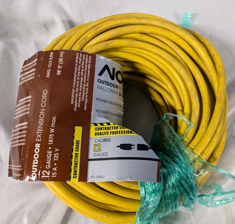 Nova Outdoor Extension Cord. 98' 5" Long. Discolouration Present from Previous use. Tested For Power.