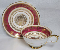 Paragon Double Warrant Red Border w/Gold Design Cup & Saucer . Saucer Rings True , Cup Does Not (small crack near handle & side) .