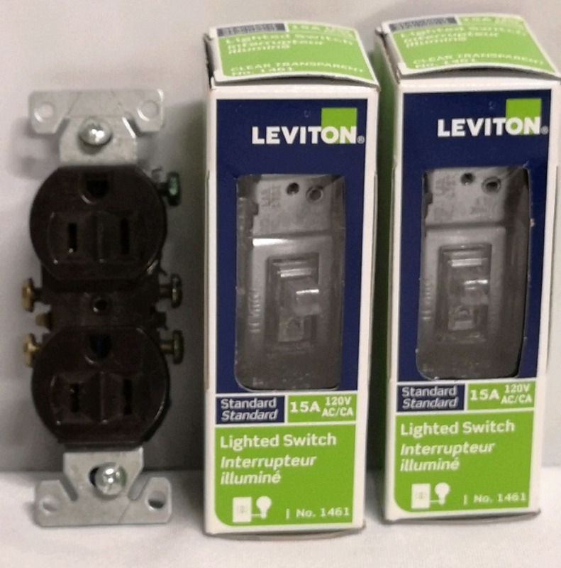 2 New Leviton Light Switches 15A + Outlet