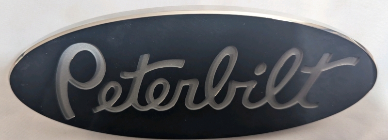 New: Peterbilt Logo Name Emblem OES. Sand Blasted. 8" x 3.25". Retails for Over 50$