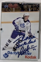 Toronto Maple Leafs Memorabilia Lot Includes Autographed Darryl Sittler Picture *No COA*, 1996-97 Calendar, 1927-1988 Trivia Book, 2000 Official Yearbook, Mini Stock, Puck, Poster And Team Pendants