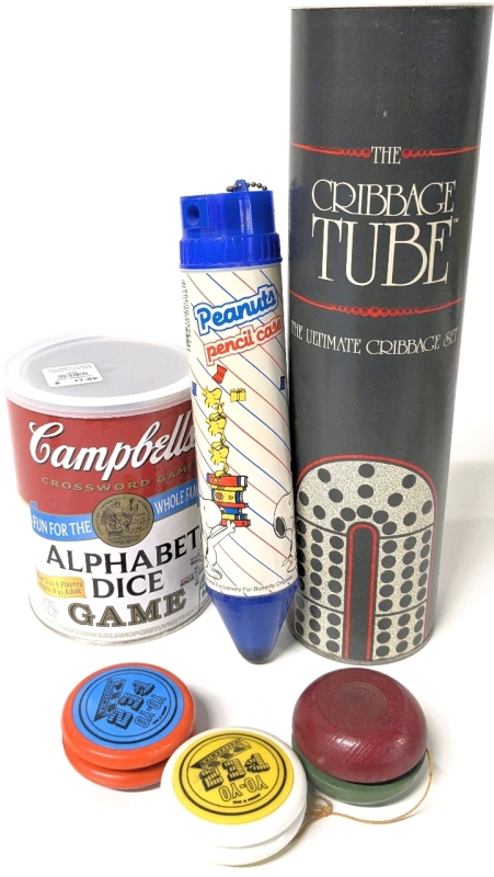 1965 PEANUTS Pencil Case w Contents, 3 YO-YO (1 Duncan, 2 PEZ), New "The Cribbage Tube" & Campbell's Alphabet Dice Crossword Game (Complete) | Tube 11.5" Tall
