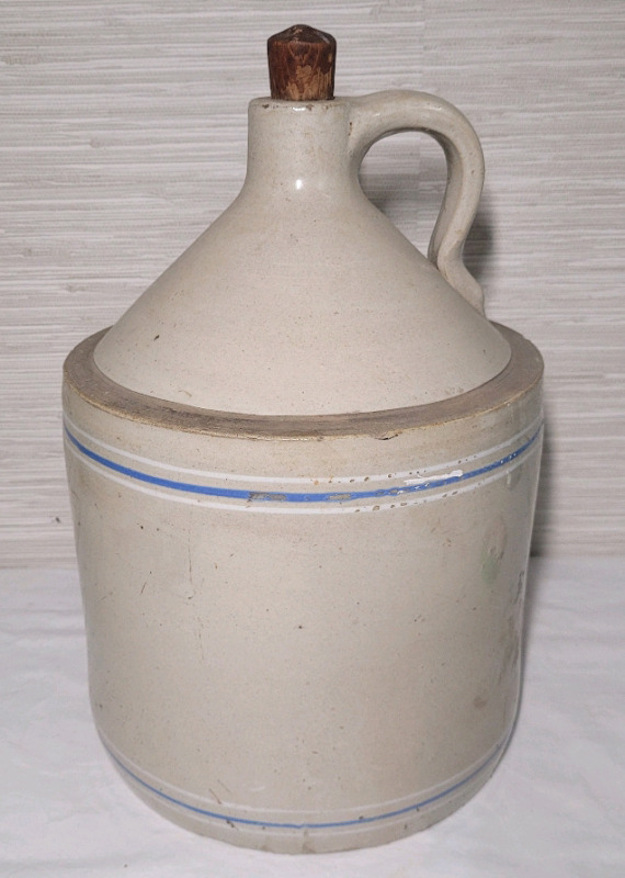 Vintage Toronto Pottery Co. Stoneware Crock Jug with Cork . Measures 13.5" tall & 9.5" diameter . Appears to be #3 Jug . No Cracks , Some minor chips on edge