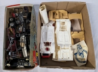 Collection of Vintage Model Car Parts. Tires, Frames and Outer shells. Unable to Determine if There Are Any Complete Sets.