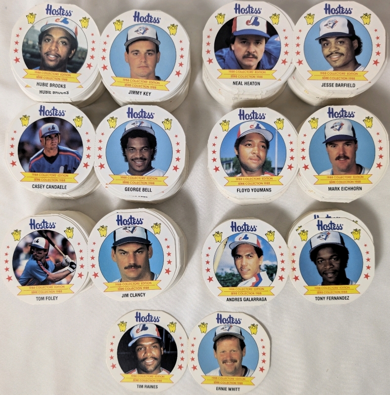 1988 Hostess Baseball Trading Disc Cards. Players Included Hubie Brooks, Jimmy Key, Neal Heaton, Jesse Barfield, Casey Candaele, George Bell, Floyd Youmans, Mark Eichhorn, Tom Foley, Jim Clancy, Andres Galarraga, Tony Fernandez, Tim Raines Ernie Whitt.