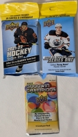 Lot Of New Trading Cards 1 2021-22 Upper Deck NHL Hockey Series One 26 Cards, 1 2022-23 Upper Deck NHL Hockey Series One 30 Cards & 2023 Goodwin Champions Pack 5 Cards