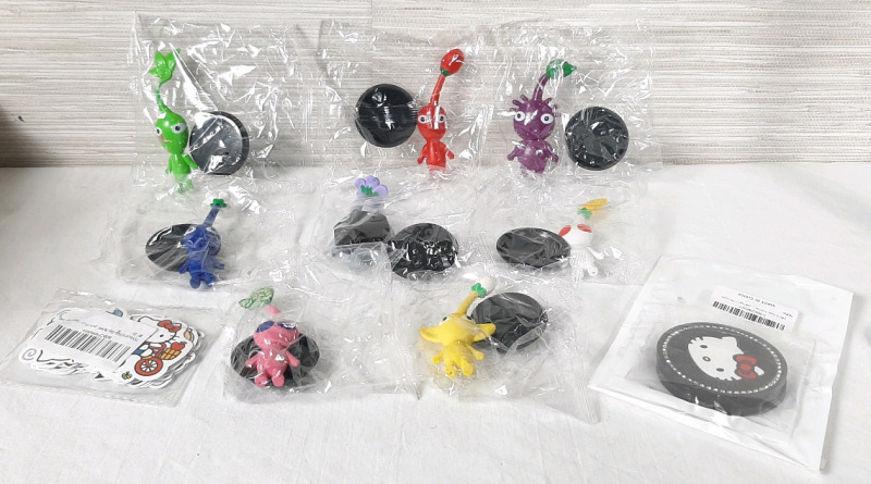 New Eight Pikmin Figurines with Stand Pieces (Each Figure is roughly 4" Tall) & Hello Kitty Themed Stickers & Coasters