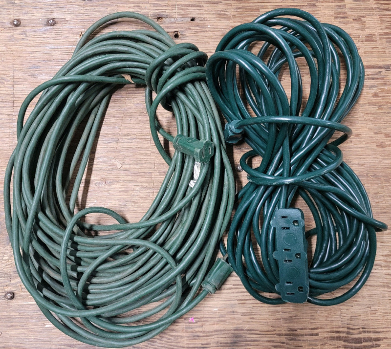 Two (2) 50ft Indoor / Outdoor Extension Cords . One (1) 2-Prong Cord & One (1) 3-Prong Cord