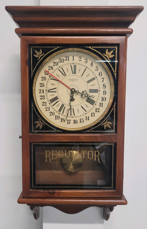 New England Clock Co. Regulator Wind-Up Pendulum Wall Clock #266 w/Key . Pendulum swings for 2 min. and stops , would benefit from service before use . Measures 15.5"×29"