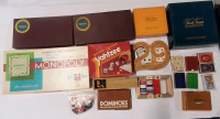 Large Lot of Family Board Games and Playing Cards, Including Monopoly, Scrabble X2, Trivial Pursuit X2, Yahtzew, Dominoes, Cribbage, Checkers, Card Decks X7