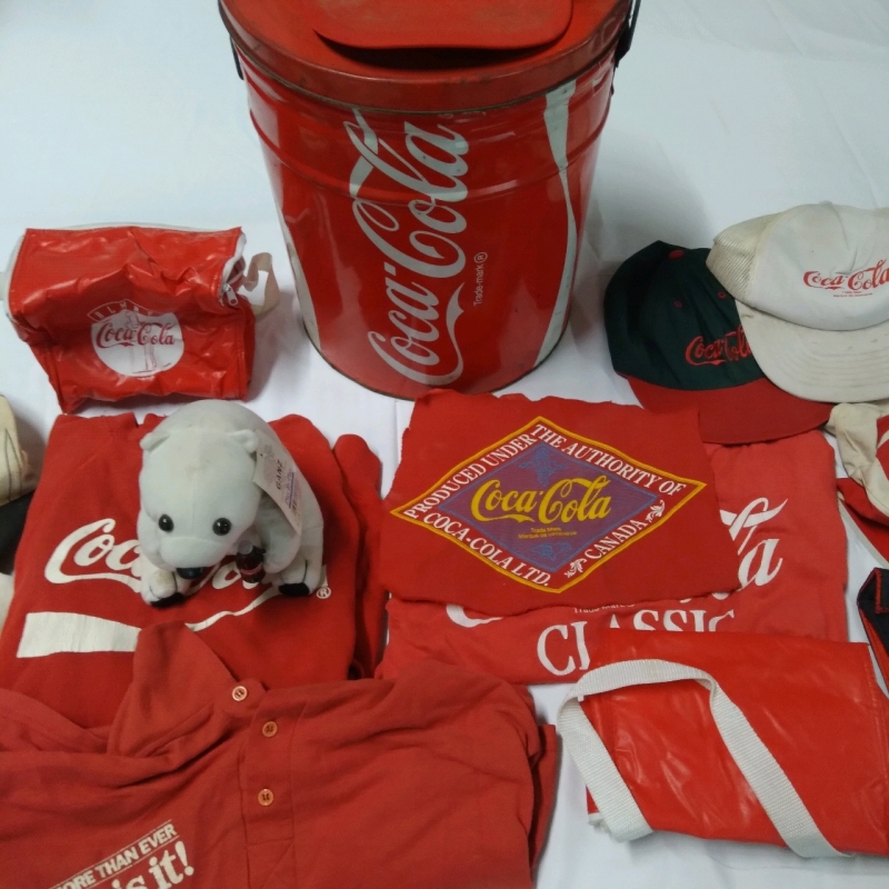 Various Coke-Cola Collectables Shirts, Hats, Lunchboxes, Plush, & 14" Tin Can