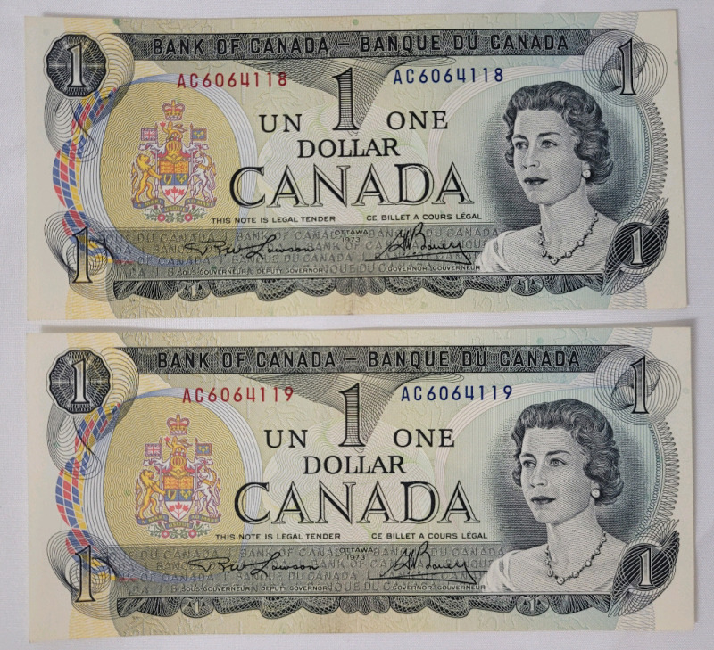 1973 Canadian Bank of Canada One Dollar Bank Notes with Consecutive Numbers . Two (2) Bank Notes in Excellent Condition and Appear Uncirculated with no bends or folds