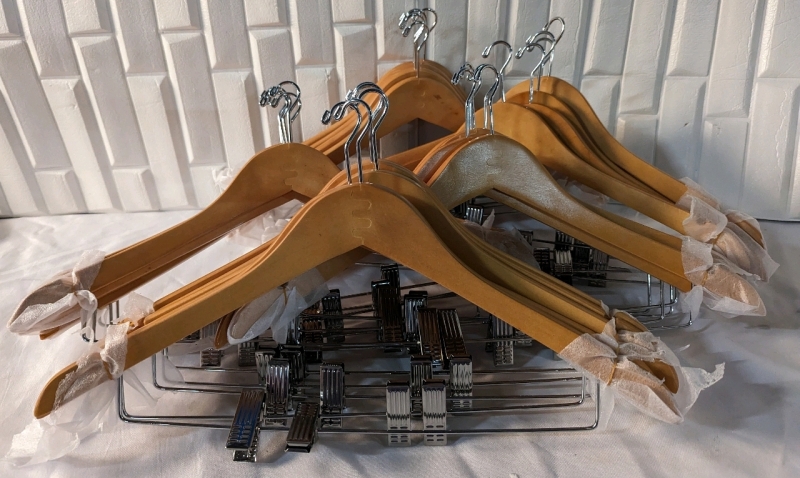 25 Wooden Hangers with Pants Clips.