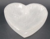 Selemite Mineral Heart Shape Bowl , measures 1 1/4"×4" diameter . Selemite (gypsum) is believed to carry potent energy that can provide protection and improve well-being .