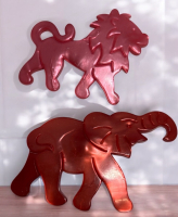 Two Vintage Moonglow Carved Elephant + Lion Brooches