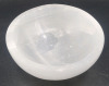 Selemite Mineral Bowl , measures 1 3/4" tall & 4" diameter . Selemite (gypsum) is believed to carry potent energy that can provide protection and improve well-being . - 3