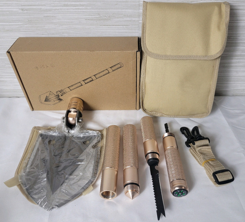 New - Outdoor Camping Portable Survival Shovel . Measures 30" long when fully assembled